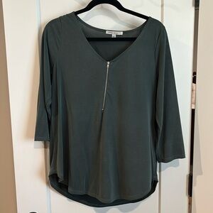 Gently worn. Green. Quarter sleeve top